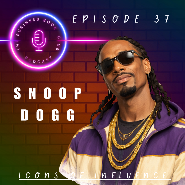 Snoop Dogg posing, wearing sunglasses and gold chains with a microphone backdrop.